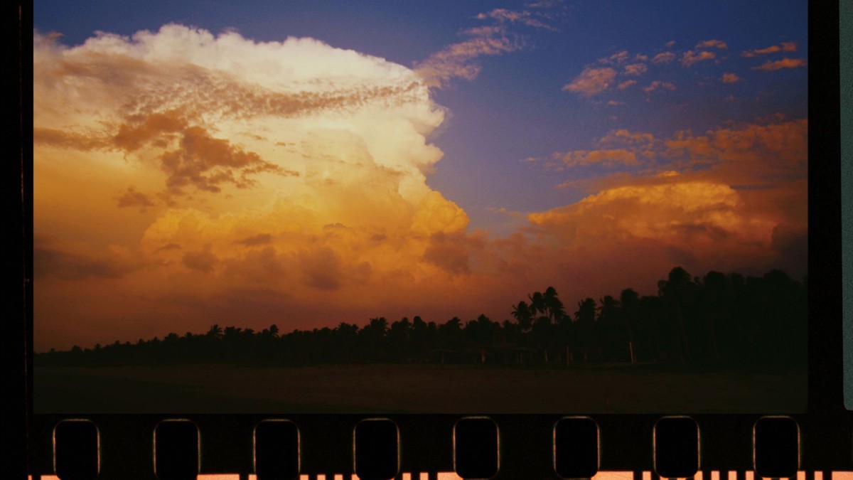 A photo of camera film negative showing a sky and landscape