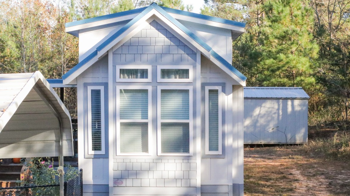 A blue and white tiny house